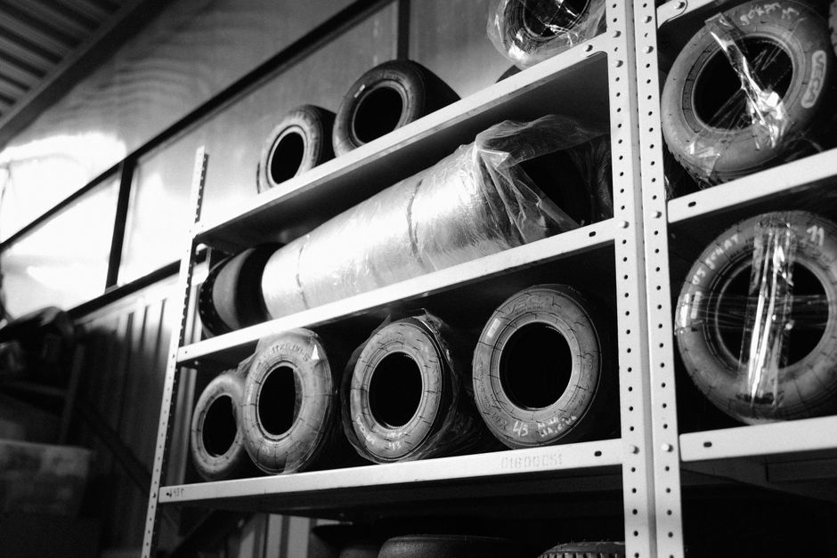 Organized tires on storage racks in a secure facility